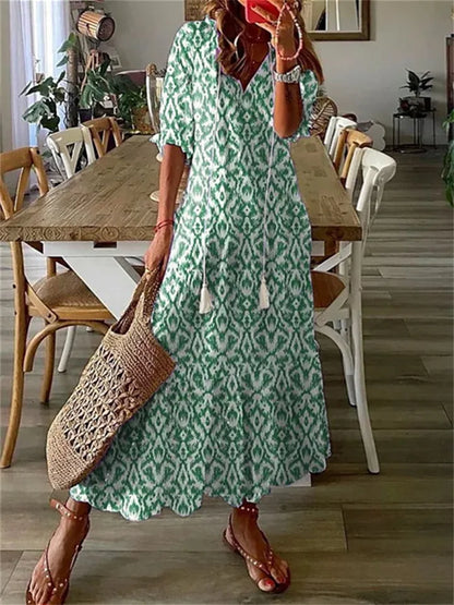 Clara - Robe Maxi d'Été Femme à Imprimé Ethnique Col V avec Pompons et Jupe Ample Bohème