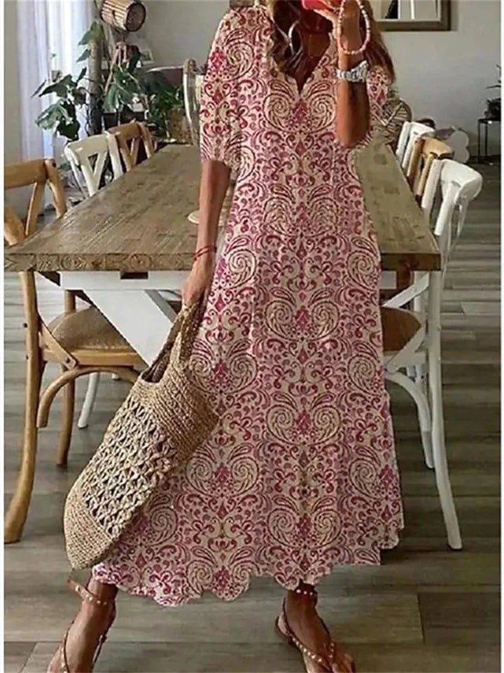 Clara - Robe Maxi d'Été Femme à Imprimé Ethnique Col V avec Pompons et Jupe Ample Bohème